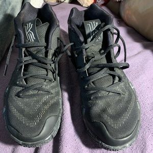 Kyries black and white basketball shoes